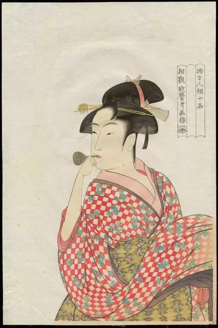《吹玻璃球的女人》喜多川歌麿